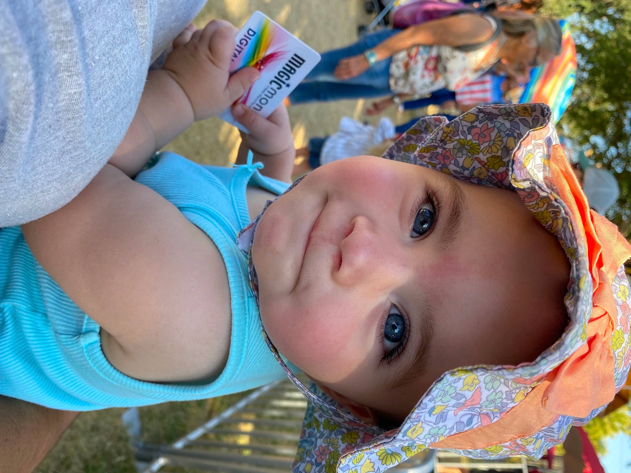 Aleia is registered to the contest to win money with this photo: baby, blue, electric_blue, eyelash, face, fun, grass, happy, hat, headgear, headwear, leisure, mouth, nose, person, plant, recreation, skin, summer, toddler