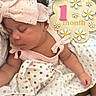 India joined the competition — help win amazing prizes! baby, newborn, sleeping, headband, pink, blanket, polka_dot, milestone, sign, infant, cute, wrapped, resting, soft, peaceful, child, one_month, portrait, indoors, person