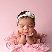Aurora is registered to the contest to win money with this photo: newborn, baby, infant, headband, flower, pink, blanket, sleeping, cute, portrait, hands, feet, soft, studio, child, peaceful, closeup, resting, skin, adorable