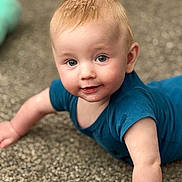 Elijah joined the competition — help win amazing prizes! baby, child, infant, crawling, blue_shirt, carpet, face, eyes, skin, hair, expression, close_up, indoors, cute, young, person, portrait, smiling, happy, playful
