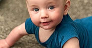 Elijah joined the competition — help win amazing prizes! baby, child, infant, crawling, blue_shirt, carpet, face, eyes, skin, hair, expression, close_up, indoors, cute, young, person, portrait, smiling, happy, playful