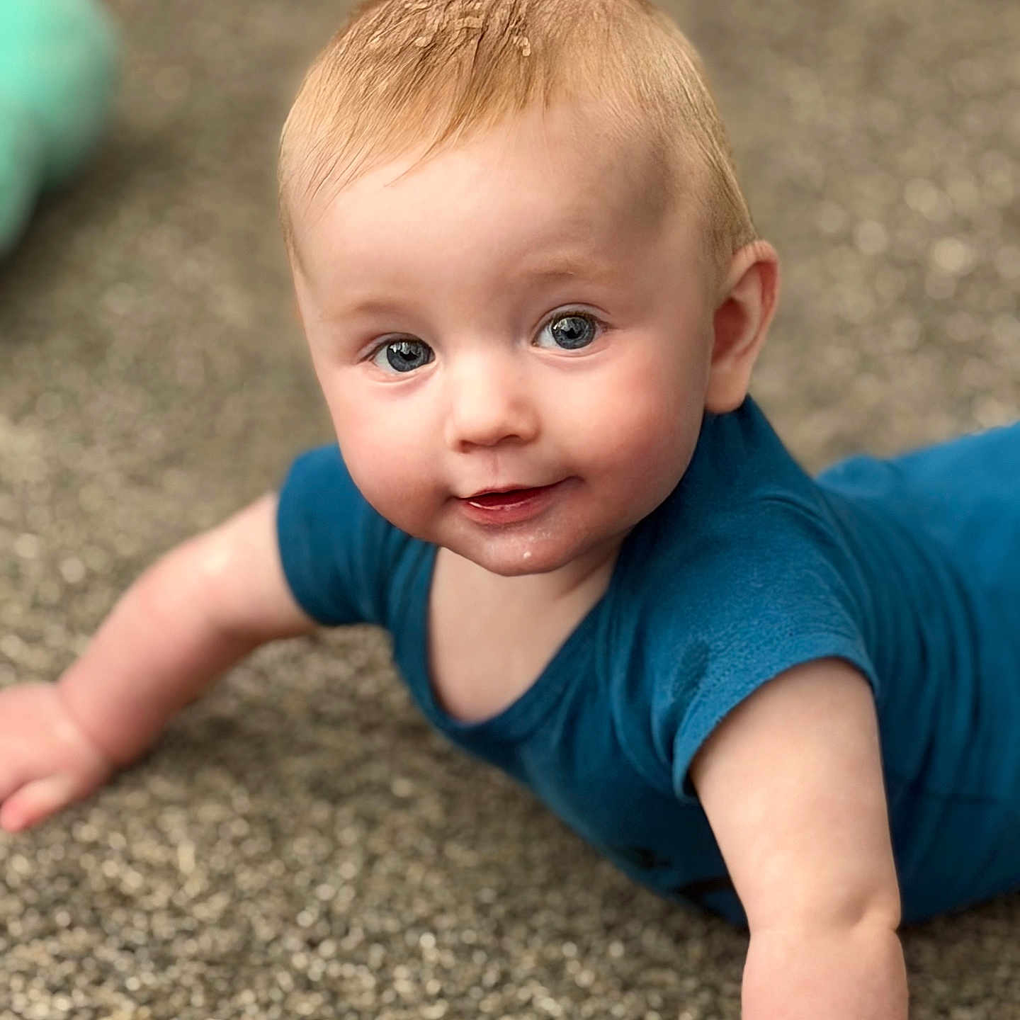 Elijah joined the competition — help win amazing prizes! baby, child, infant, crawling, blue_shirt, carpet, face, eyes, skin, hair, expression, close_up, indoors, cute, young, person, portrait, smiling, happy, playful