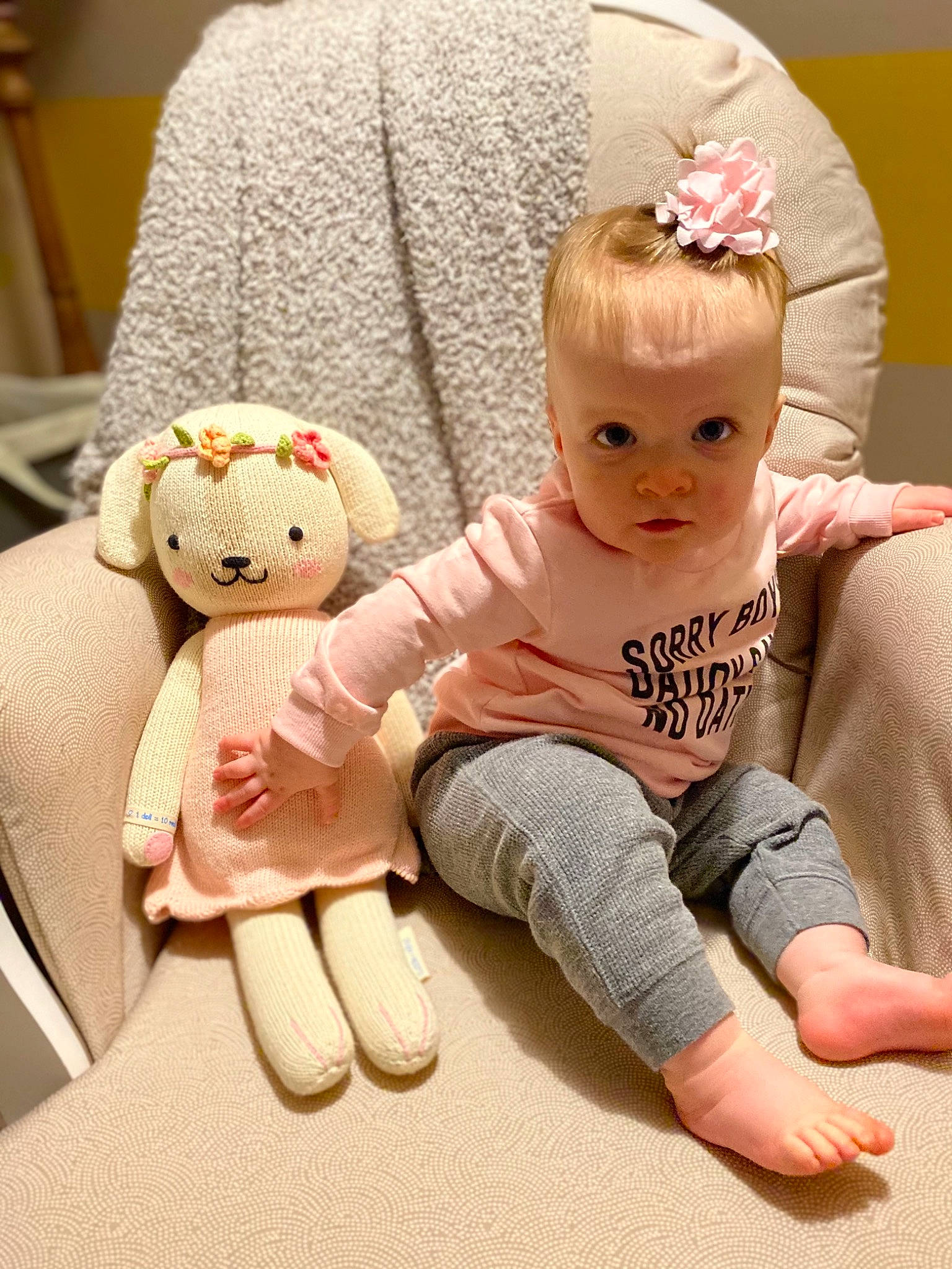 Nadia is registered to the contest to win money with this photo: ankle, baby, baby_products, baby_toddler_clothing, baby_toys, barefoot, comfort, foot, headband, headpiece, linens, person, plush, sock, stuffed_toy, teddy_bear, textile, toe, toy