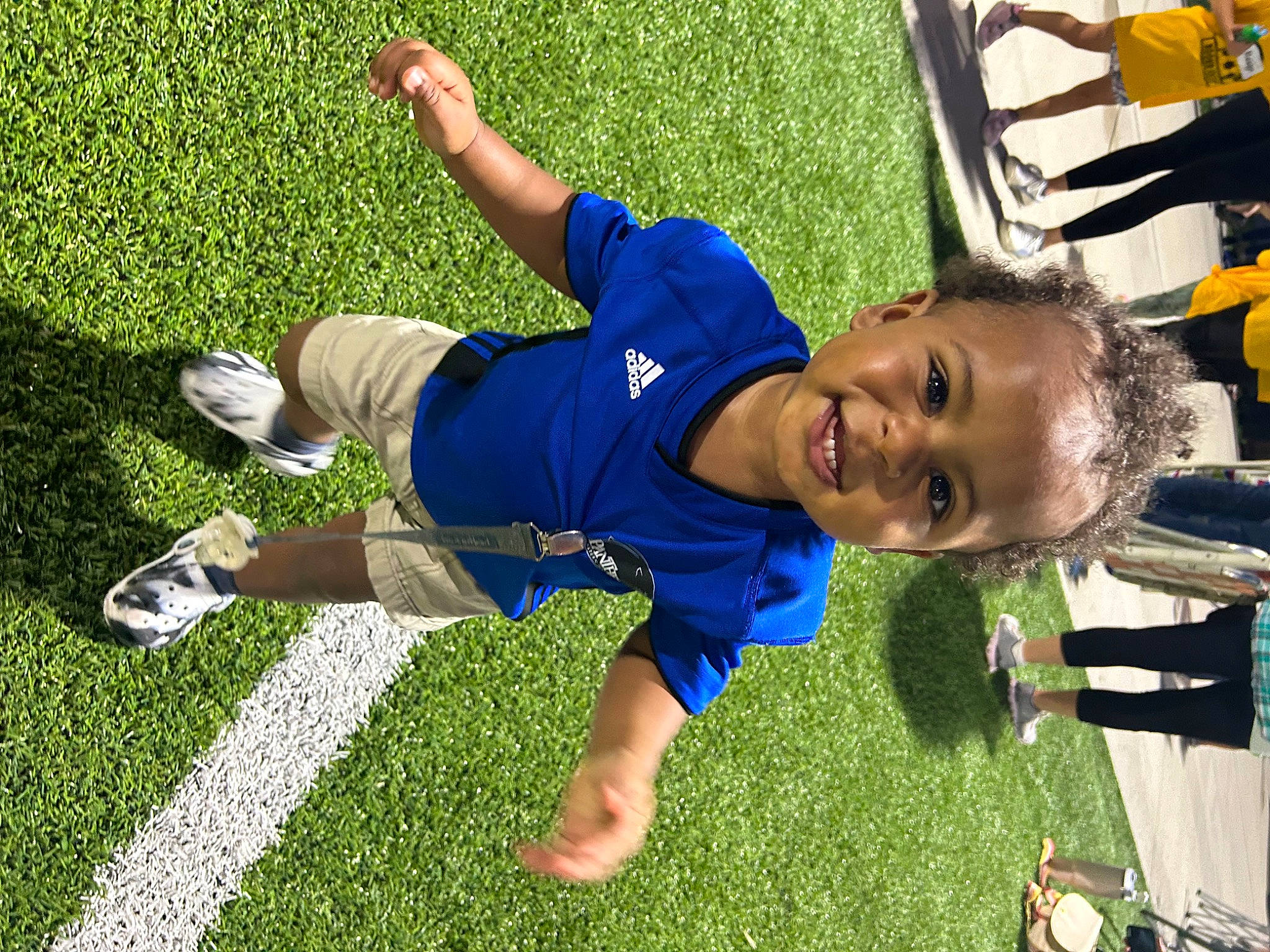 Kaison joined the competition — help win amazing prizes! competition_event, electric_blue, fun, grass, happy, joint, joy, knee, lawn, leisure, people_in_nature, person, player, recreation, shoe, shorts, smile, sneakers, sports, sportswear