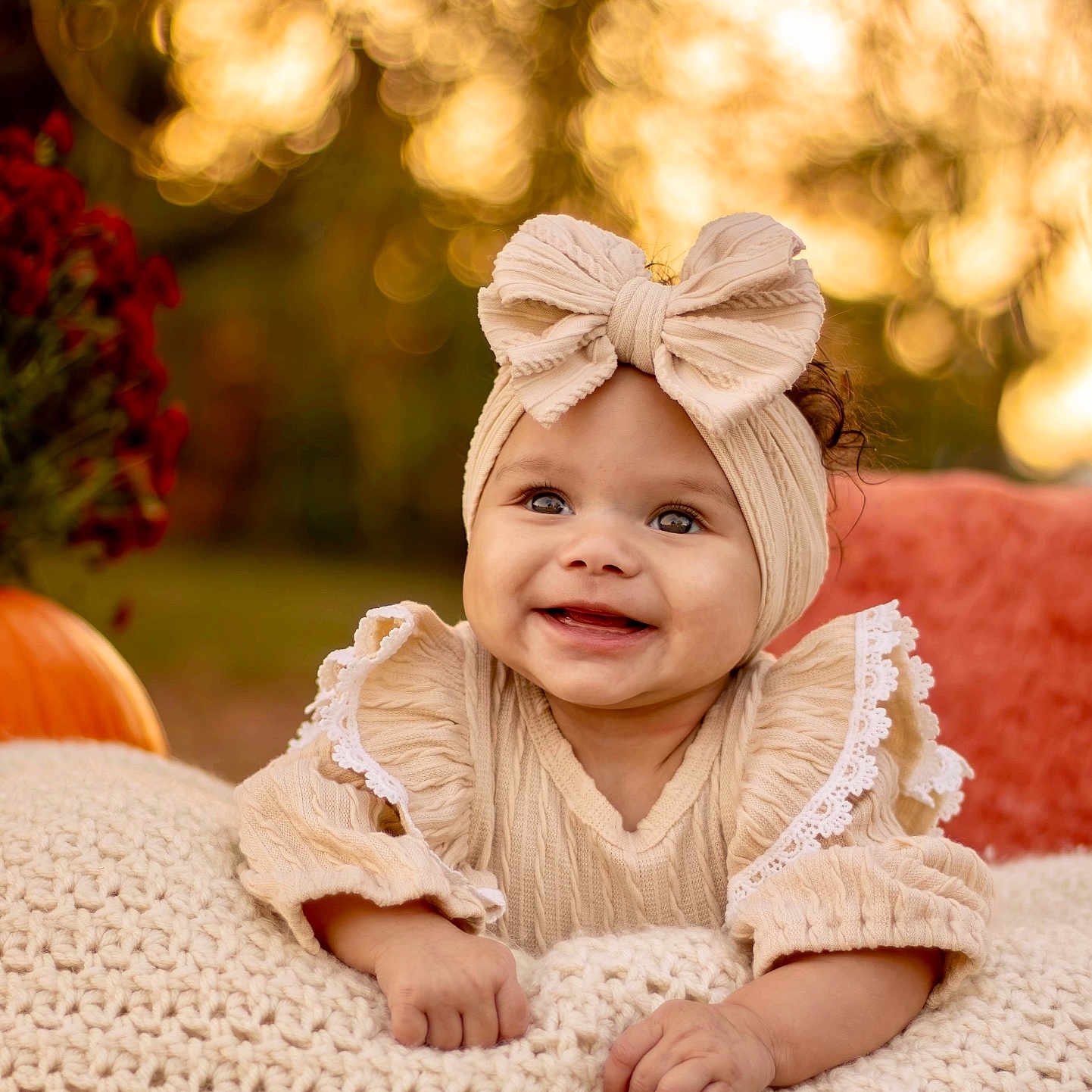 Saylar joined the competition — help win amazing prizes! baby, babylaughing, blonde, bodypart, bonnet, cap, clothing, face, finger, hair, hand, happy, hat, head, newborn, person, photography, portrait, sitting, smile