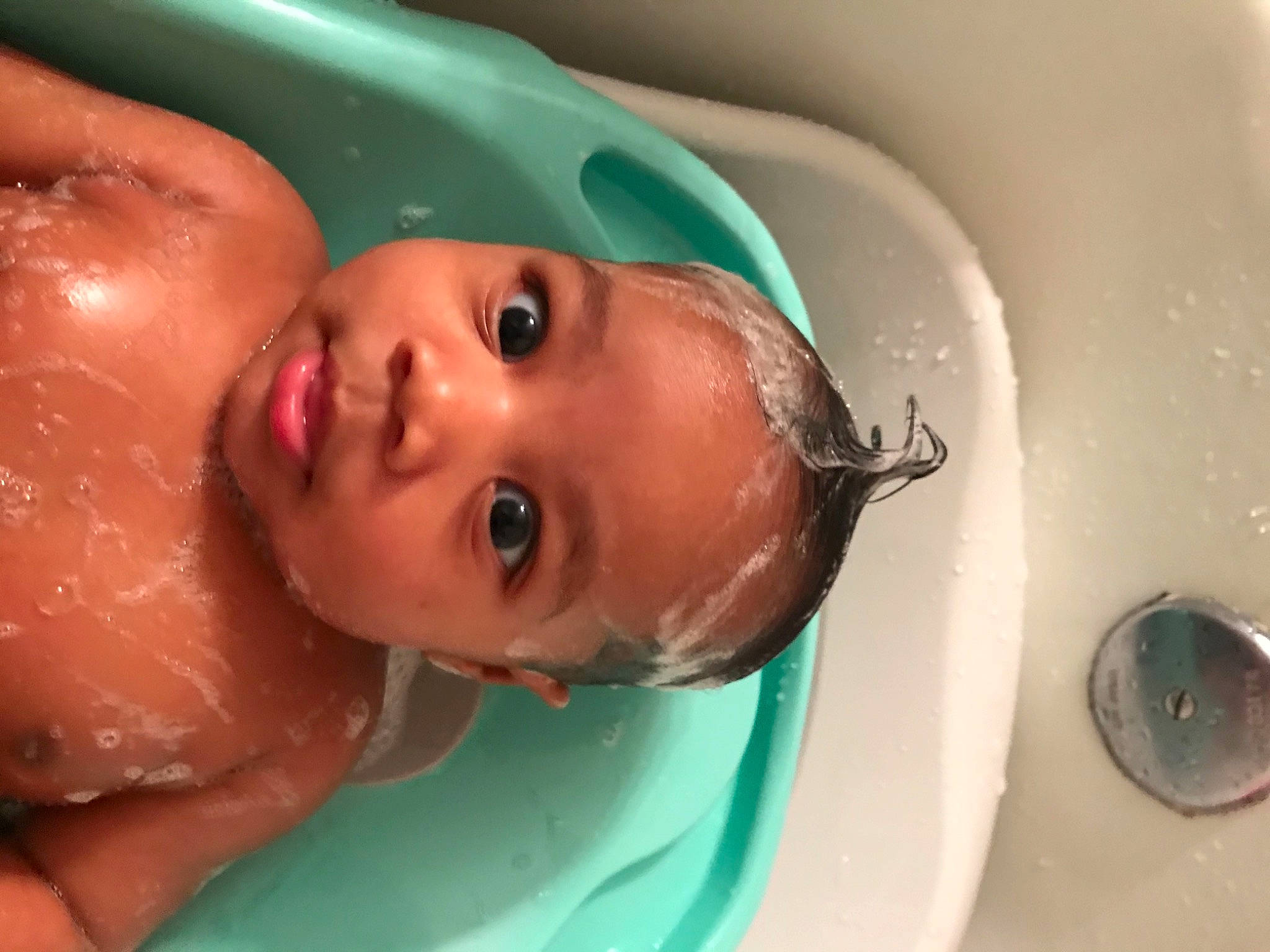 Amirah joined the competition — help win amazing prizes! arm, bathing, bathroom, cheek, chest, ear, eye, eyebrow, eyelash, fluid, human_body, iris, jaw, lip, mouth, nose, person, plumbing_fixture, skin, toddler