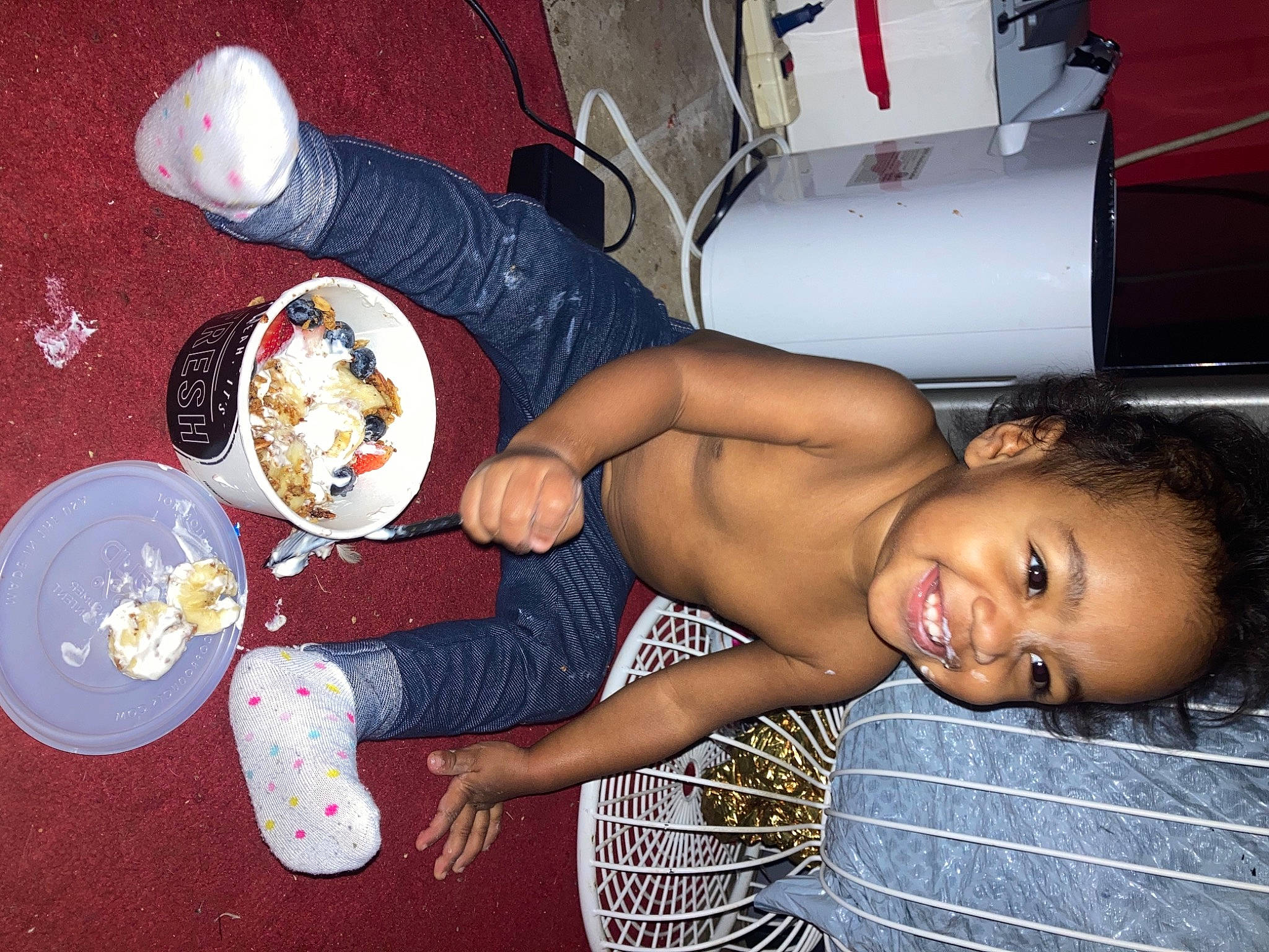 Amirah is registered to the contest to win money with this photo: arm, automotive_exterior, bumper, chest, child, dishware, food, foot, fun, hand, happy, human_body, human_leg, joy, person, plate, shoe, shorts, smile, tableware