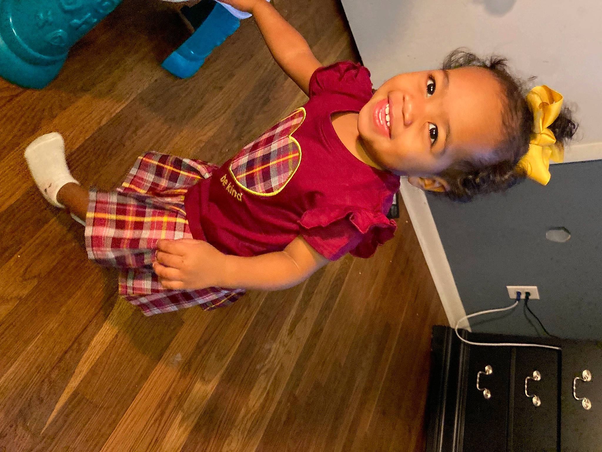 Amirah joined the competition — help win amazing prizes! child, floor, flooring, fun, happy, hardwood, head, human_leg, joy, knee, laminate_flooring, leisure, person, room, smile, sock, thigh, toddler, varnish, wood