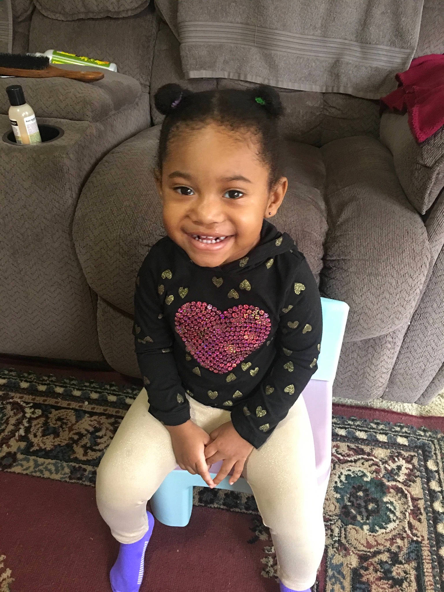 Kiarah joined the competition — help win amazing prizes! baby, baby_toddler_clothing, car_seat, cheek, child, comfort, couch, eye, face, flooring, happy, human_leg, iris, joy, knee, person, sitting, sleeve, smile, sock
