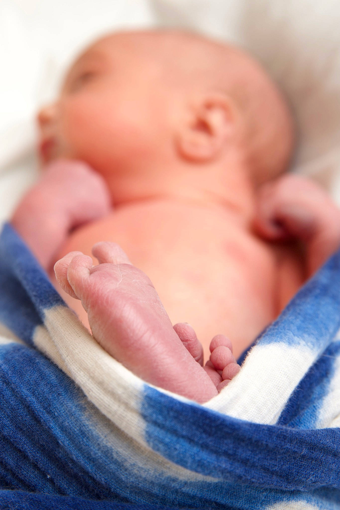 Jonathan is registered to the contest to win money with this photo: abdomen, baby, baby_sleeping, baby_toddler_clothing, cheek, comfort, electric_blue, finger, flesh, gesture, happy, human_body, lip, nail, neck, nose, peach, person, stomach, thumb