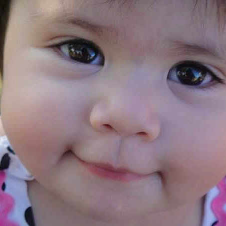 Aria is registered to the contest to win money with this photo: baby, cheek, child, chin, ear, eyebrow, eyelash, face, forehead, grass, hairstyle, happy, iris, lip, mammal, mouth, nose, skin, smile, toddler