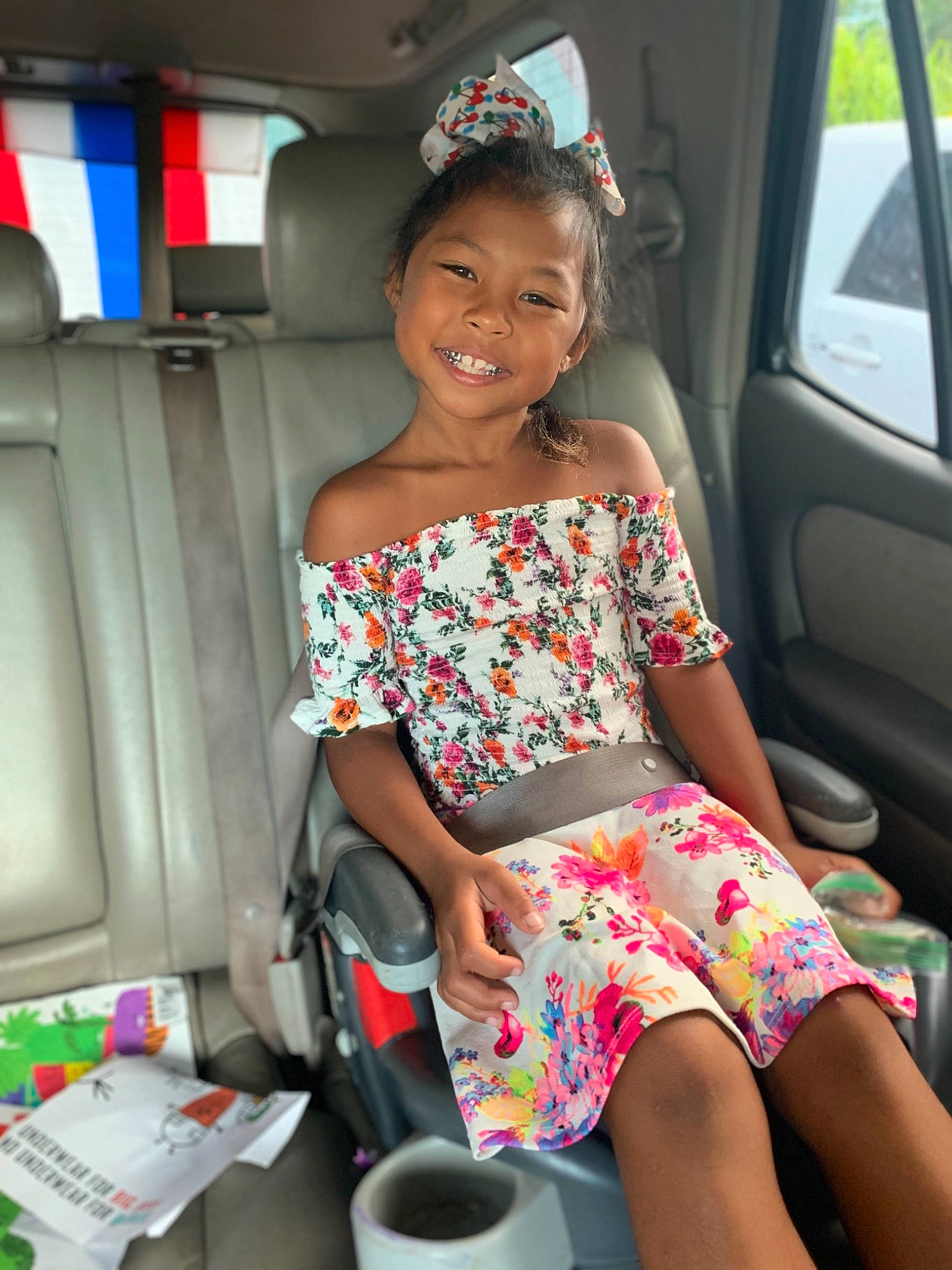 Karisma is registered to the contest to win money with this photo: auto_part, car, car_seat, child, family_car, joy, person, smile, vehicle