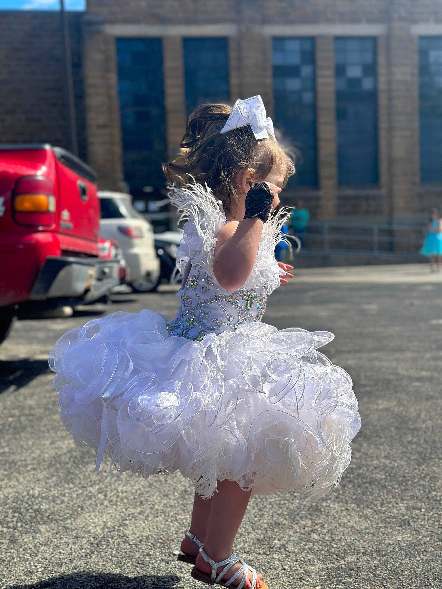 Jaycelynn joined the competition — help win amazing prizes! bridal_accessory, bridal_clothing, bridal_party_dress, dance, dress, electric_blue, entertainment, event, gown, happy, headpiece, performing_arts, person, pink, road, sandal, shoe, street, summer, wedding_dress