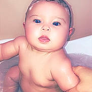 Alicia joined the competition — help win amazing prizes! baby, bathing, bathroom, bathtub, bodypart, face, finger, hand, happy, head, indoors, newborn, person, photography, portrait, room, sitting, smile, tub, washing