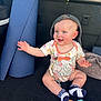 Savannah is registered to the contest to win money with this photo: baby, blue_mat, bright_eyes, cap, cheerful, child, clothing, cute, elephant, floor, happy, indoor, infant, onesie, playful, reaching, seated, smiling, socks, toy
