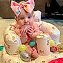 Savannah joined the competition — help win amazing prizes! adorable, baby, baby_seat, bow, bright_colors, carpet, chewing, child, colorful_eggs, cute, glitter_egg, indoors, infant, pink_bow, playful, soft_seat, teddy_bear_pattern, toes, toy, wide_eyes