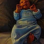 Zayden is registered to the contest to win money with this photo: baby, blanket, blue_clothing, child, comfort, couch, cute, face, foot, hand, indoor, infant, onesie, portrait, relaxed, resting, sleepwear, smiling, soft_lighting, young_child
