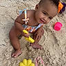 Layla joined the competition — help win amazing prizes! baby, beach, boy, clothing, coast, face, footwear, head, nature, outdoors, person, photography, portrait, sandal, sea, shoreline, soil, summer, swimwear, water