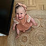 toddler, child, smiling, headband, dress, indoor, rug, wooden_floor, happy, sitting, baby, person, cute, candid, texture, flooring, home, portrait, looking_up, playful