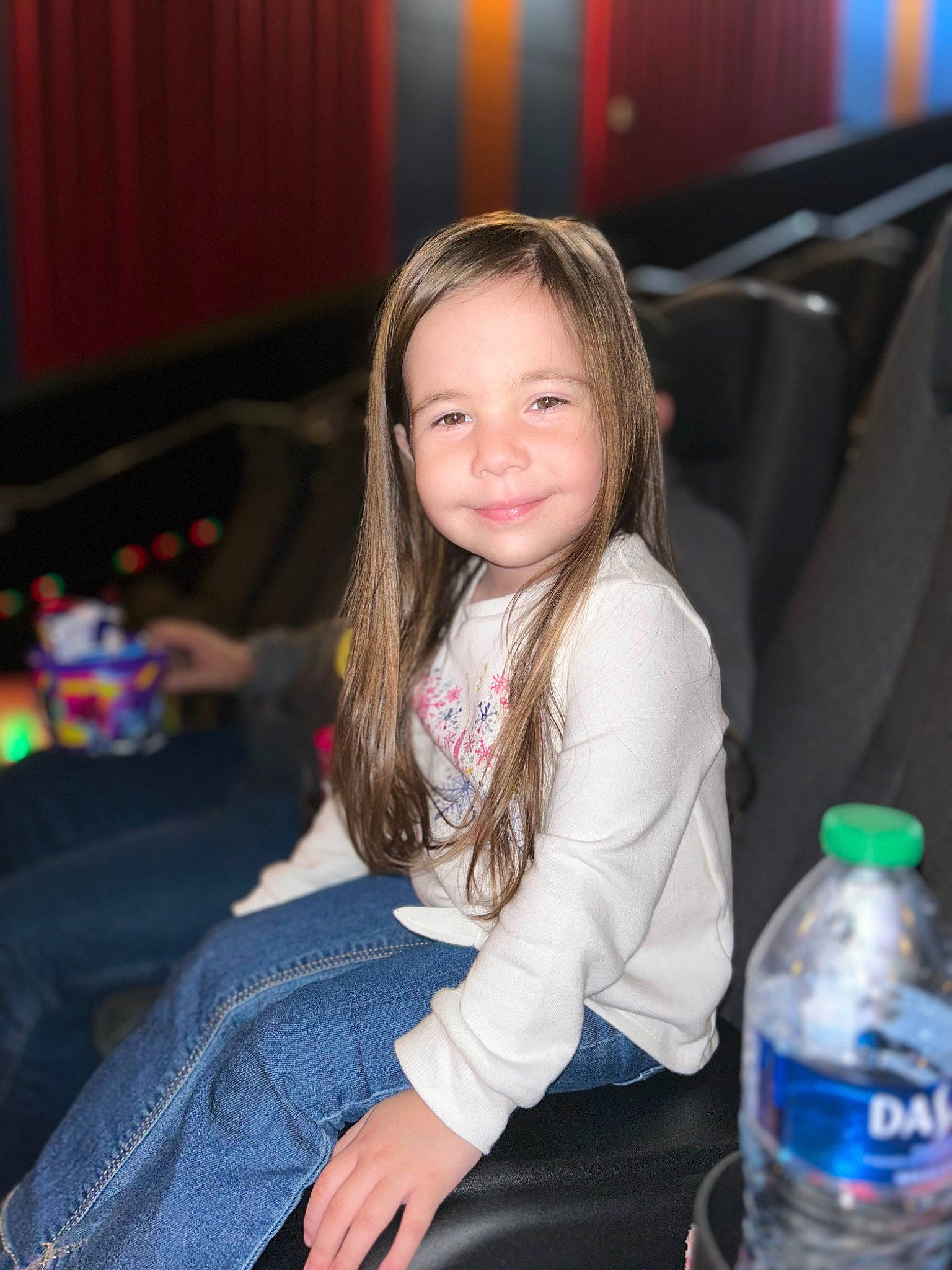 Helen Marie is registered to the contest to win money with this photo: blond, bottle, chair, child, drink, electric_blue, event, flash_photography, fun, hairstyle, happy, iris, joy, leisure, person, plastic_bottle, recreation, sitting, skin, smile