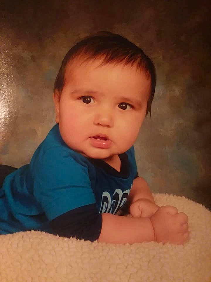 William is registered to the contest to win money with this photo: baby, cheek, child, chin, eye, eyebrow, face, finger, forehead, hand, head, human, iris, lip, mouth, muscle, nose, person, photography, skin