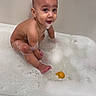 Makaius is registered to the contest to win money with this photo: baby, bath, bathtub, bubbles, child, cute, expression, face, foam, happy, head, indoor, playing, rubber_duck, sitting, skin, soap, toddler, water, wet