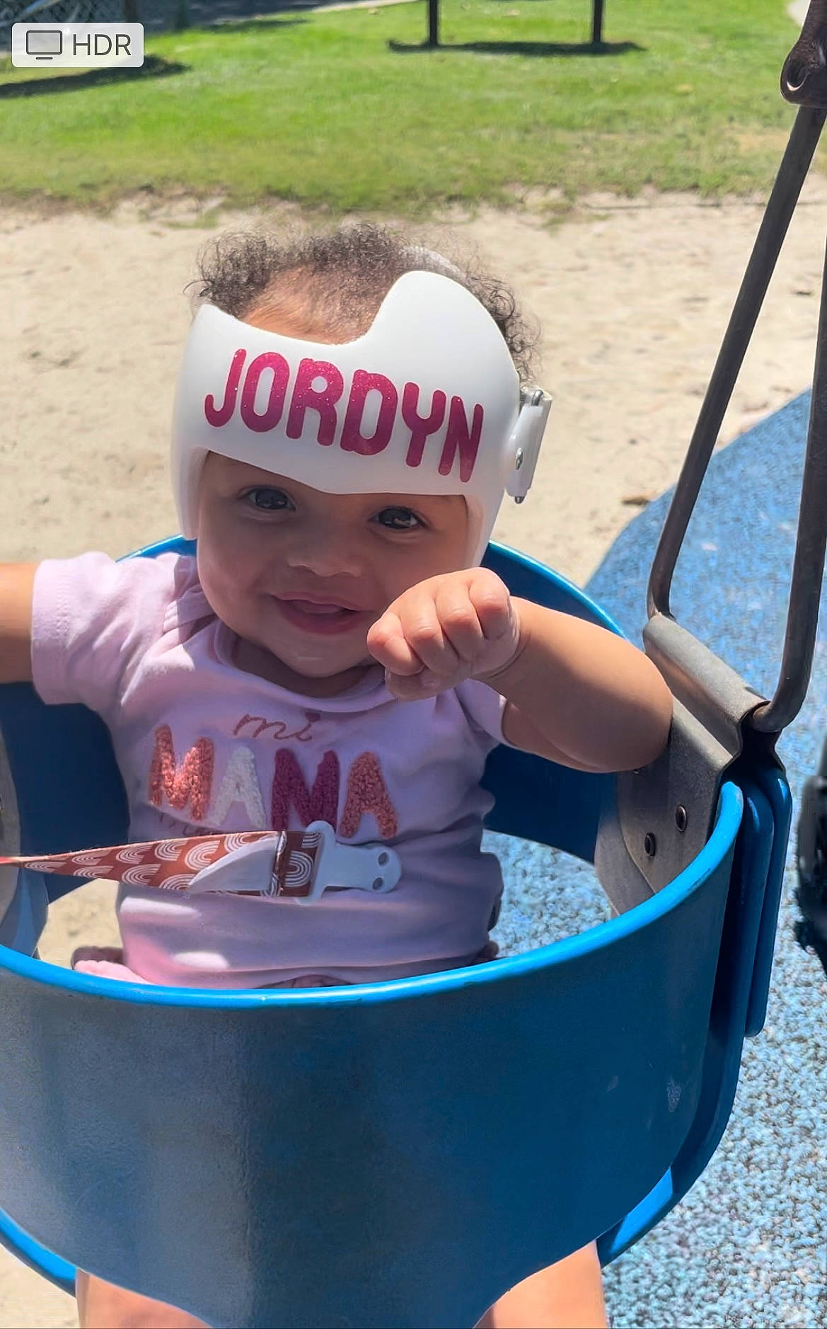 Jordyn is registered to the contest to win money with this photo: baby, baby_products, baseball_cap, cap, child, electric_blue, facial_expression, fun, grass, happy, hat, headwear, leisure, person, plant, play, product, recreation, smile, toddler