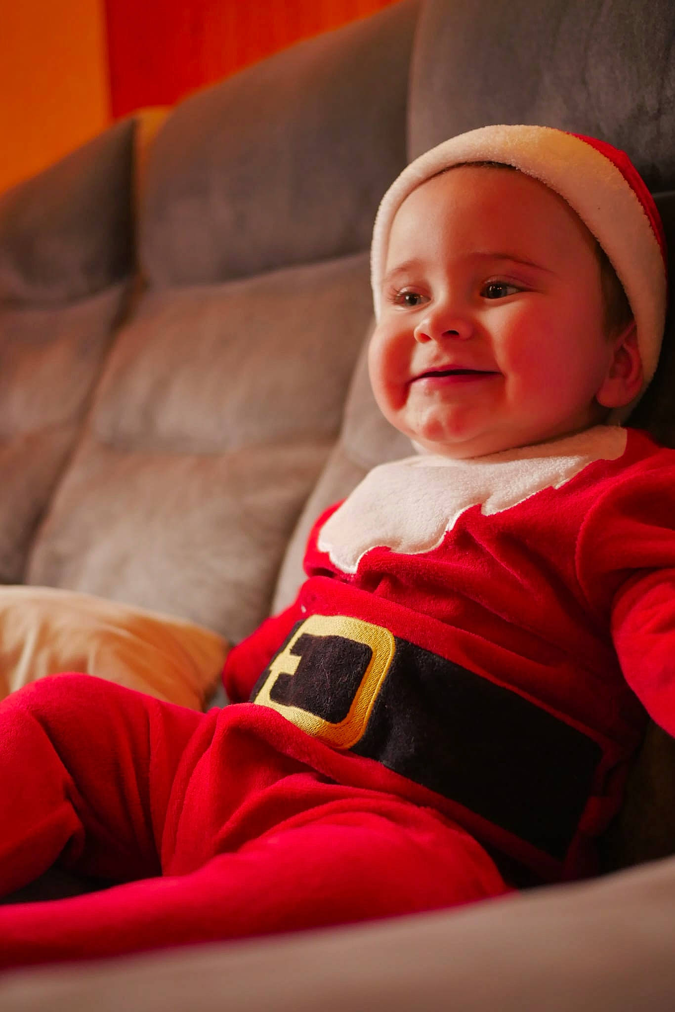 Gabriel participe au concours pour gagner de l'argent avec cette photo : baby, baby_laughing, baby_toddler_clothing, carmine, cheek, child, christmas, comfort, couch, fun, happy, joy, lap, laugh, lip, mouth, person, sitting, skin, sleeve
