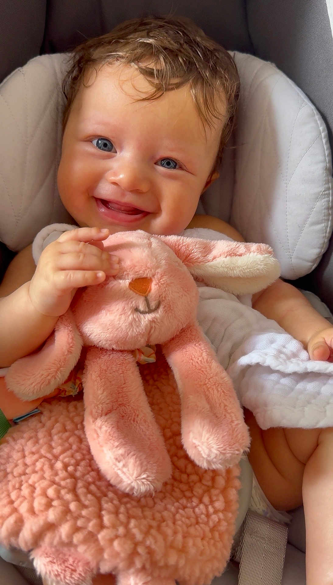 Angelika joined the competition — help win amazing prizes! baby, blue_eyes, smiling, plush_toy, pink, bunny, car_seat, blanket, child, cute, happy, infant, soft_toy, cozy, toddler, portrait, hand, face, comfort, cuddly