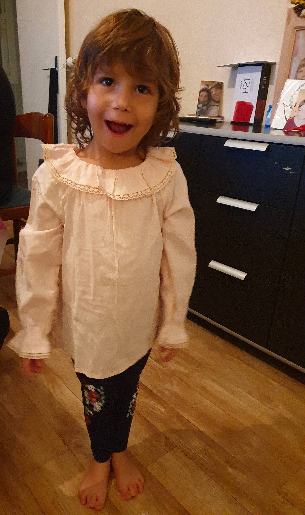 Lynaelle participe au concours pour gagner de l'argent avec cette photo : child, clothing, costume, day, dress, flooring, fun, girl, joy, leg, outerwear, person, shoulder, sleeve, smile, standing, textile, toddler, top, white