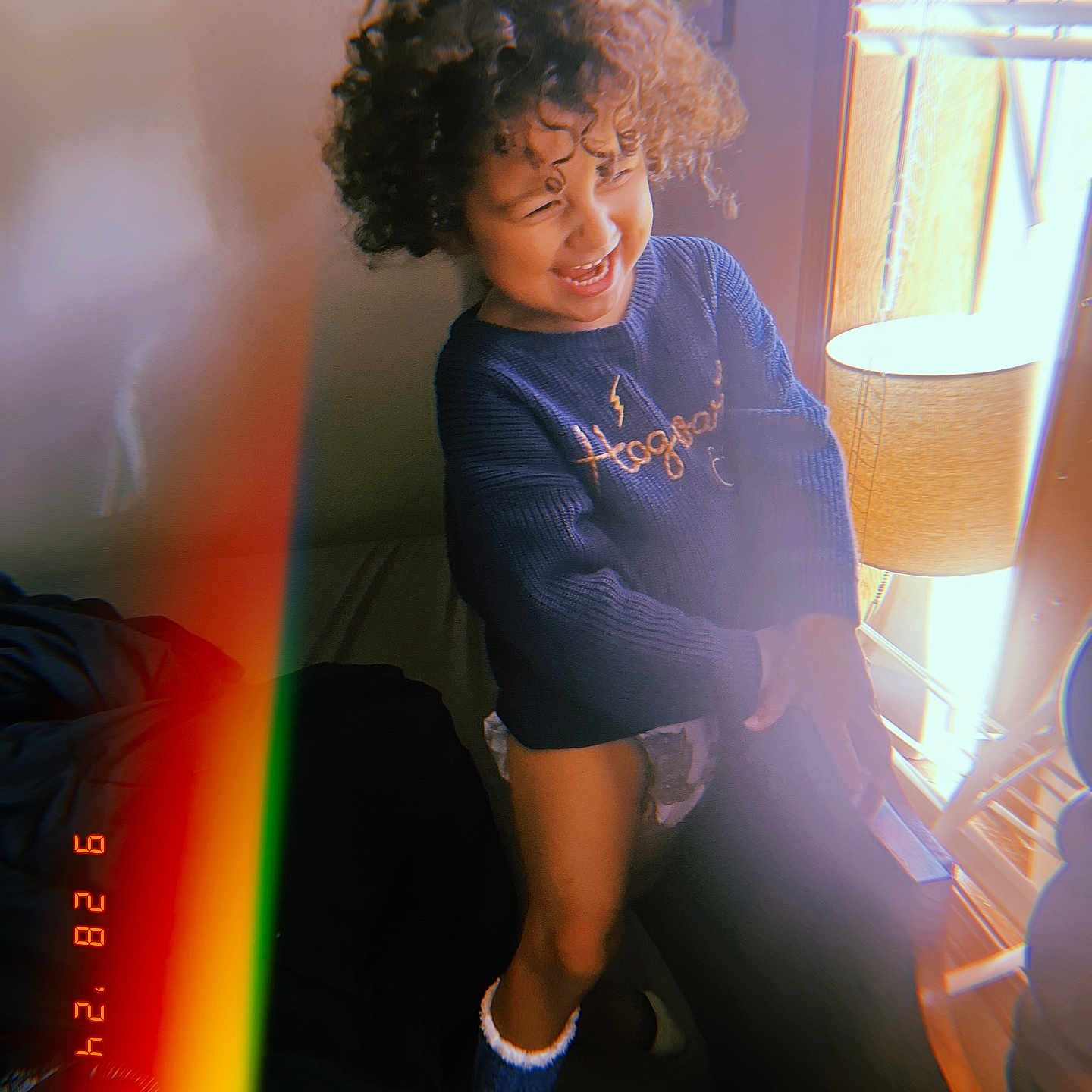 Ember joined the competition — help win amazing prizes! bodypart, clothing, couch, face, finger, footwear, furniture, hand, happy, head, hosiery, lamp, person, photography, portrait, shoe, shorts, smile, sock, tablelamp