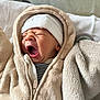 baby, newborn, yawning, hat, jacket, clothing, infant, cozy, warm, sleepy, cute, soft, child, portrait, face, mouth_open, babywear, blanket, indoor, person