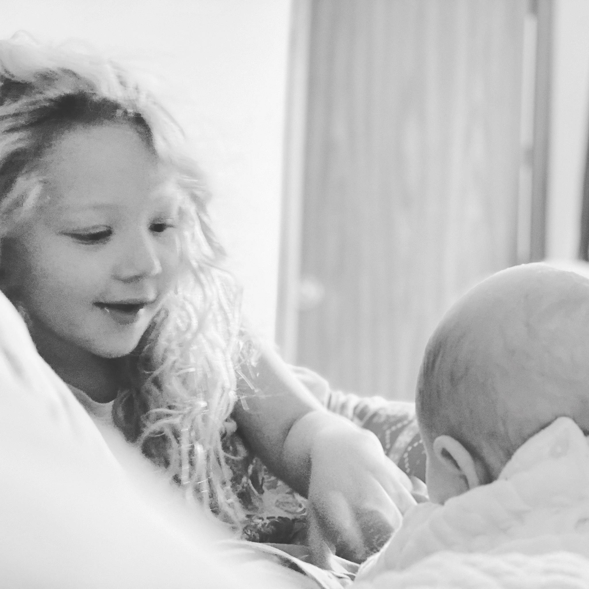 Kenzley is registered to the contest to win money with this photo: baby, birth, black_and_white, child, family, happy, monochrome, monochrome_photography, person, photograph, photography, smile, snapshot, toddler