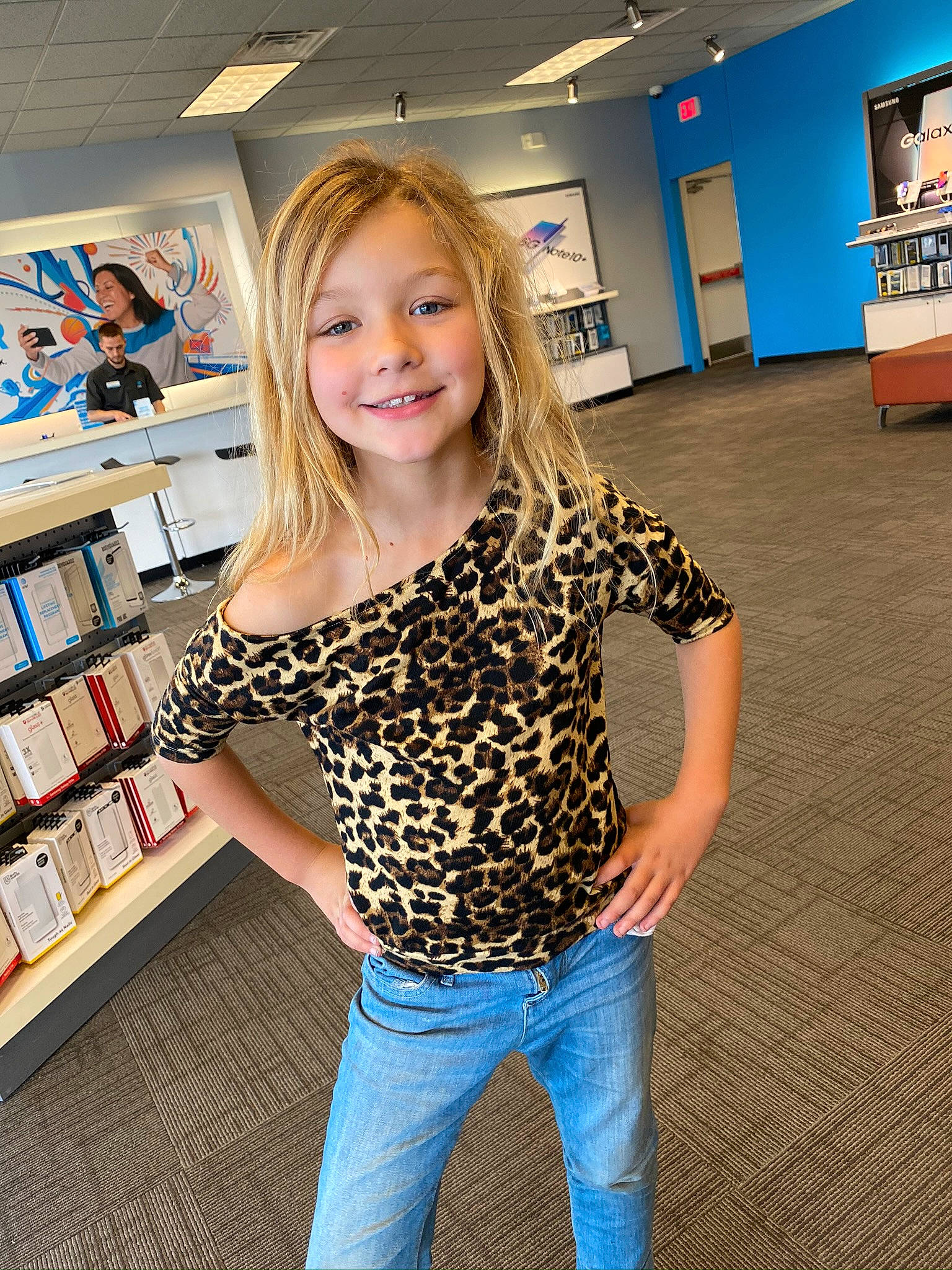 Londyn is registered to the contest to win money with this photo: blond, blue, child, child_model, denim, electric_blue, floor, flooring, footwear, fun, jeans, joy, leg, long_hair, person, photography, shoulder, smile, t_shirt, toddler