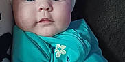 Jossalynn joined the competition — help win amazing prizes! baby, child, infant, blue_eyes, headband, white_bow, teal_clothing, floral_print, close_up, portrait, cute, soft_skin, indoor, comfort, young, small_hands, expression, face, person, newborn