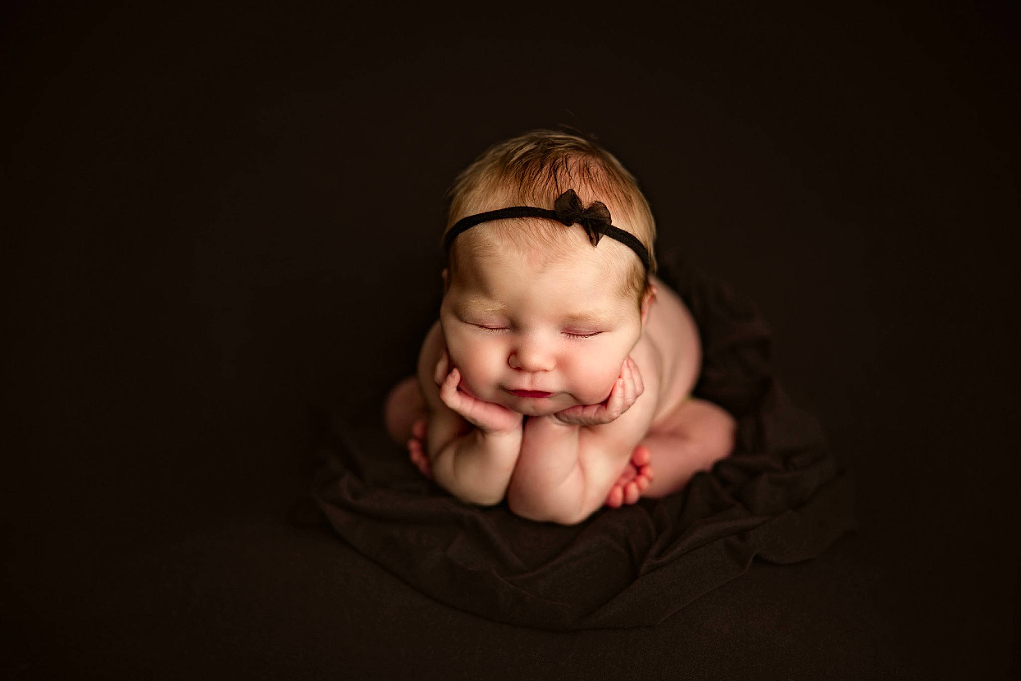 Sutton joined the competition — help win amazing prizes! baby, baby_toddler_clothing, cheek, comfort, darkness, eyelash, eyewear, flash_photography, flesh, flooring, gesture, glasses, happy, nail, person, sitting, sleeve, smile, thumb, toddler