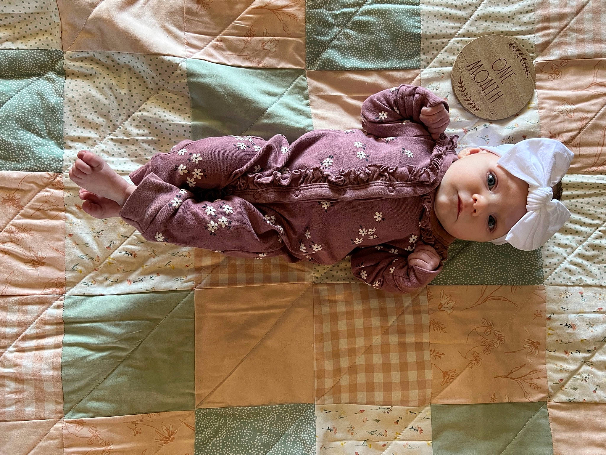 Sutton joined the competition — help win amazing prizes! bedding, child, comfort, couch, doll, dress, fashion_accessory, flooring, headwear, linens, magenta, pattern, peach, person, purple, room, sleeve, textile, tree, visual_arts
