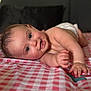 baby, blue_eyes, checkered_blanket, cheeks, child, closeup, cute, diaper, expression, face, hand, happy, indoors, infant, lying_down, person, portrait, skin, smiling, toddler