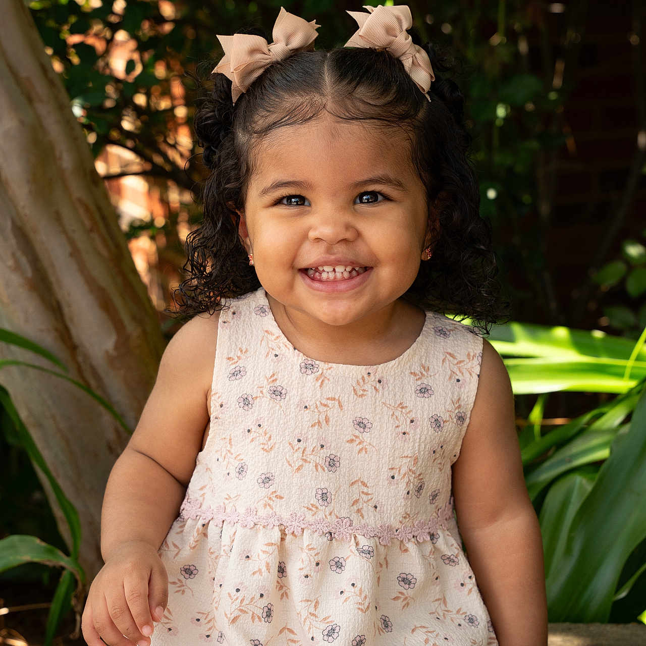 Ayla Lynn is registered to the contest to win money with this photo: bodypart, child, clothing, dress, eveningdress, face, female, finger, formalwear, girl, hand, happy, head, mouth, pattern, person, photography, portrait, sitting, smile