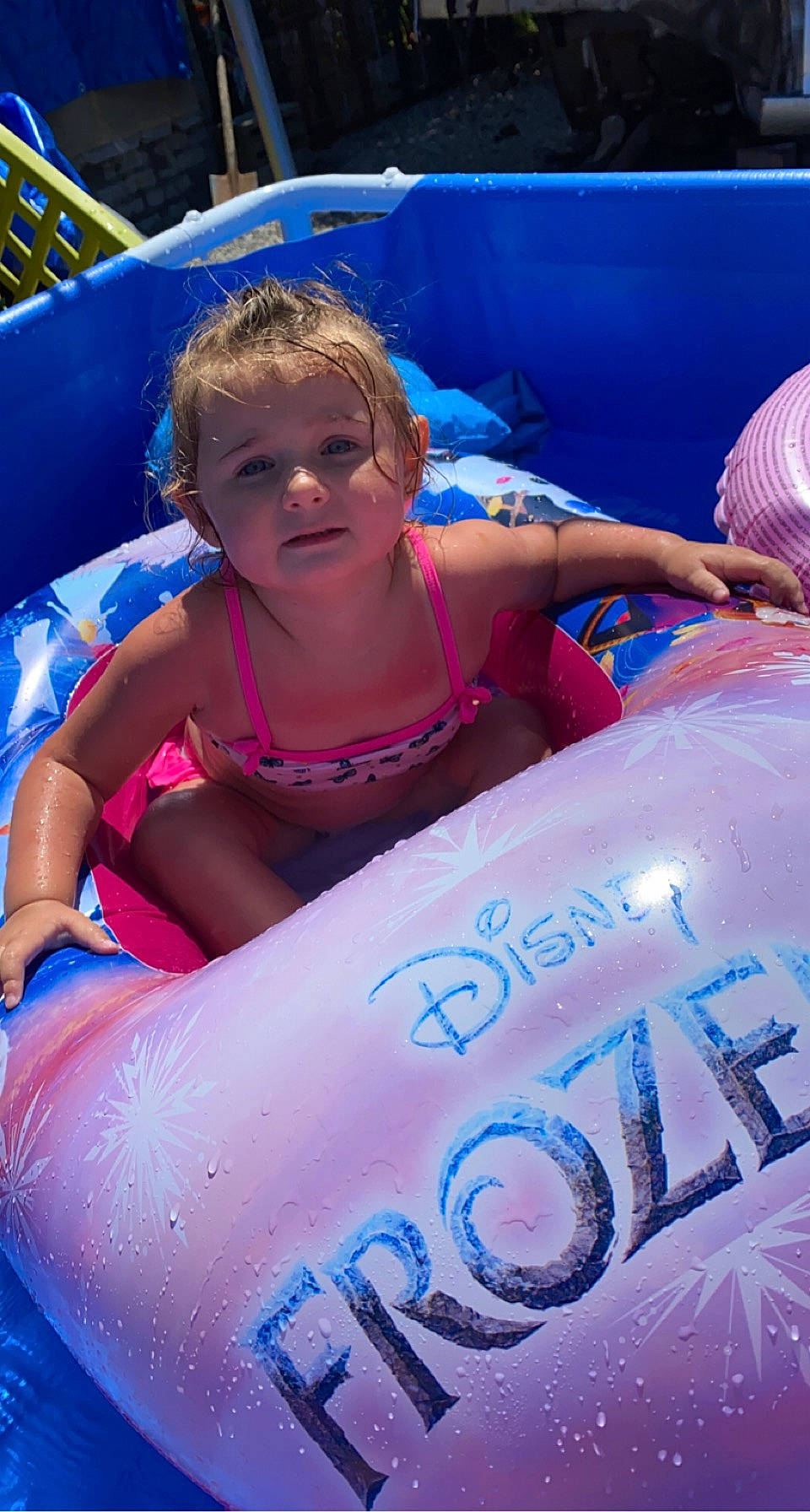 Hayley participe au concours pour gagner de l'argent avec cette photo : azure, blue, boats_and_boating_equipment_and_supplies, child, electric_blue, fun, games, handwriting, inflatable, leisure, mammal, nonbuilding_structure, outdoor_recreation, person, personal_protective_equipment, pink, recreation, swimwear, toddler, vertebrate