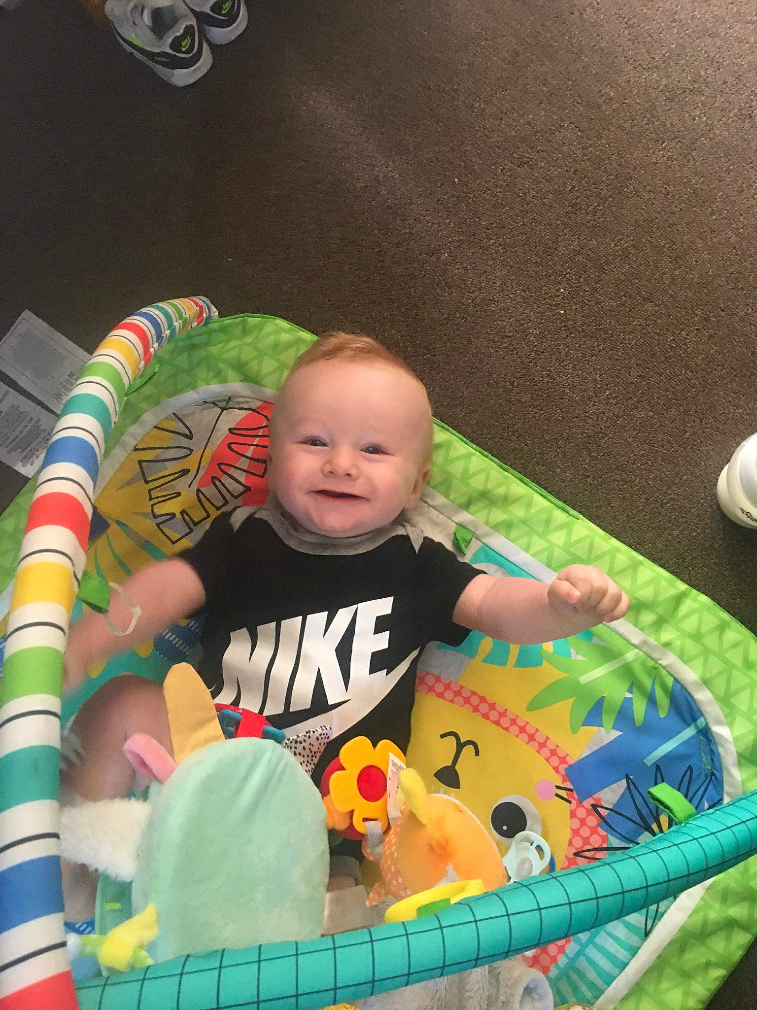 Kaden is registered to the contest to win money with this photo: baby, baby_playing_with_toys, baby_products, baby_toddler_clothing, baby_toys, child, comfort, fun, grass, happy, joy, leisure, pattern, person, play, product, recreation, sitting, smile, t_shirt