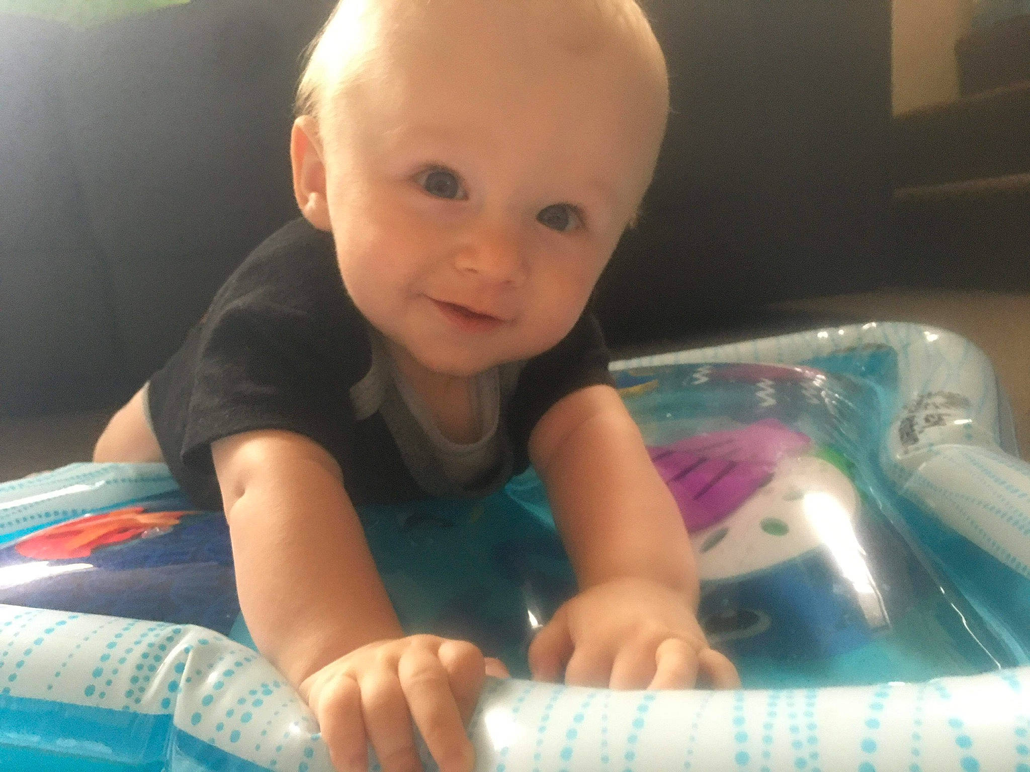 Kaden is registered to the contest to win money with this photo: baby, baby_playing_with_toys, baby_products, baby_toddler_clothing, bathing, cheek, child, comfort, finger, flooring, fun, leisure, person, play, product, sitting, skin, smile, thumb, toddler