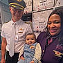 Pahal joined the competition — help win amazing prizes! baby, child, pilot, flight_attendant, airplane, uniform, smile, people, crew, indoor, portrait, holding, happy, aviation, transportation, airline, person, clothing, workplace, professional