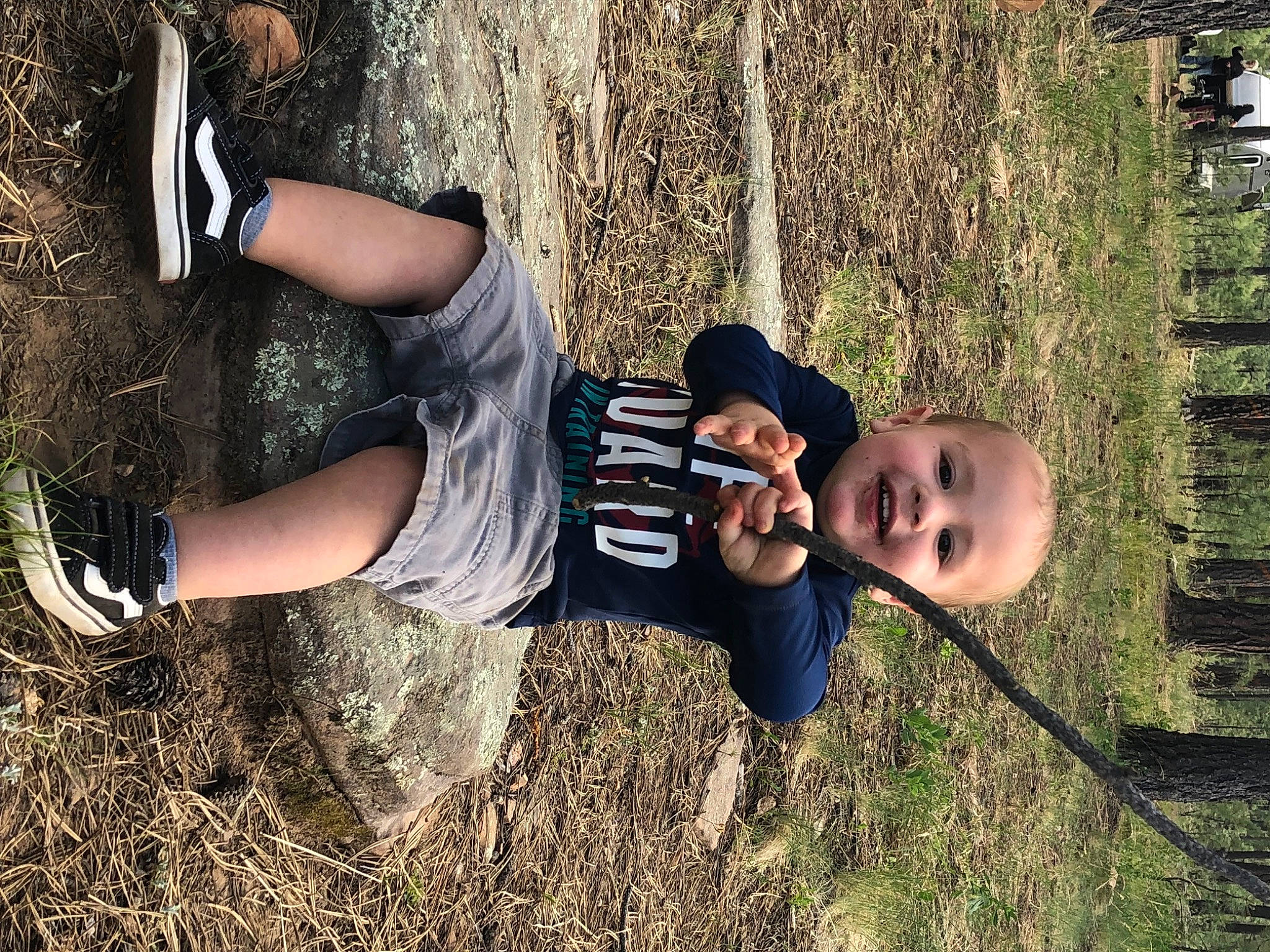 Chandler joined the competition — help win amazing prizes! baby, child, flash_photography, fun, grass, happy, hat, human_body, human_leg, joy, leisure, people_in_nature, person, plant, sitting, soil, sportswear, t_shirt, thigh, toddler