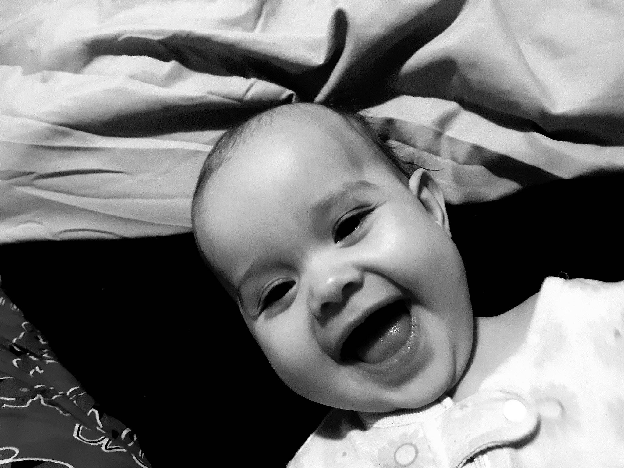 Kacie is registered to the contest to win money with this photo: baby, black, black_and_white, cheek, child, eye, eyebrow, face, facial_expression, forehead, head, lip, monochrome, monochrome_photography, nose, person, photograph, photography, skin, smile