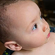 Harold is registered to the contest to win money with this photo: baby, child, face, profile, skin, ear, eye, curious, innocence, closeup, portrait, young, looking_up, soft_skin, head, expression, newborn, person, childhood, indoor