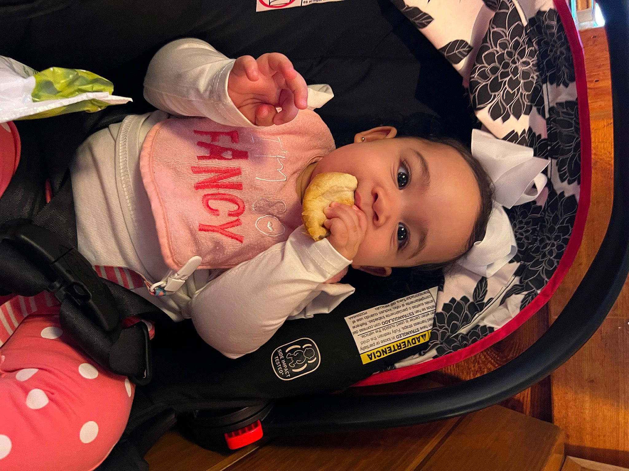 Alaiyah is registered to the contest to win money with this photo: baby, baby_carriage, baby_products, baby_toddler_clothing, carmine, cheek, child, comfort, event, fashion_accessory, happy, hat, lap, person, pink, product, room, sitting, smile, toddler