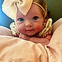 Elizabeth joined the competition — help win amazing prizes! baby, child, face, headband, bow, blue_eyes, blanket, closeup, curious, cute, infant, indoors, person, portrait, resting, soft_lighting, skin, young, toddler, clothing