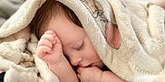 Elizabeth joined the competition — help win amazing prizes! baby, sleeping, blanket, soft, cute, infant, child, peaceful, skin, hand, face, resting, cozy, warm, wrapped, closeup, portrait, indoors, nap, adorable