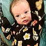 baby, infant, onesie, clothing, face, eyes, hand, blanket, bed, sleepwear, cute, child, expression, portrait, newborn, fabric, pattern, comfort, indoor, soft